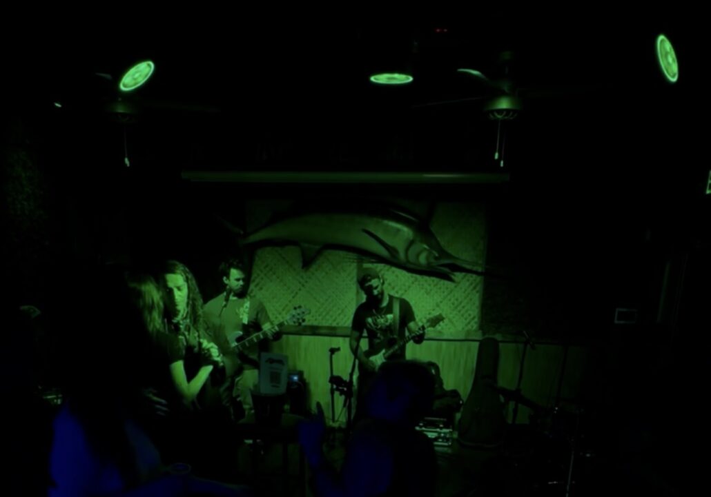 Live band performing with stage audio and lighting at Green Room in Madeira Beach, Florida